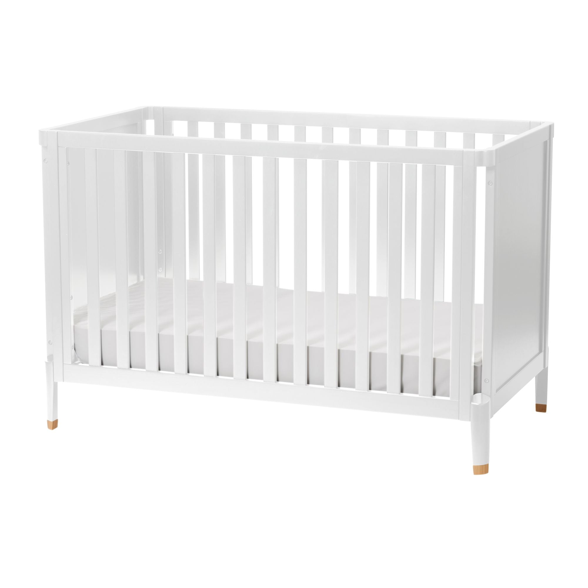 Modern 4-in-1 convertible crib made of solid New Zealand pine that grows from baby to toddler.