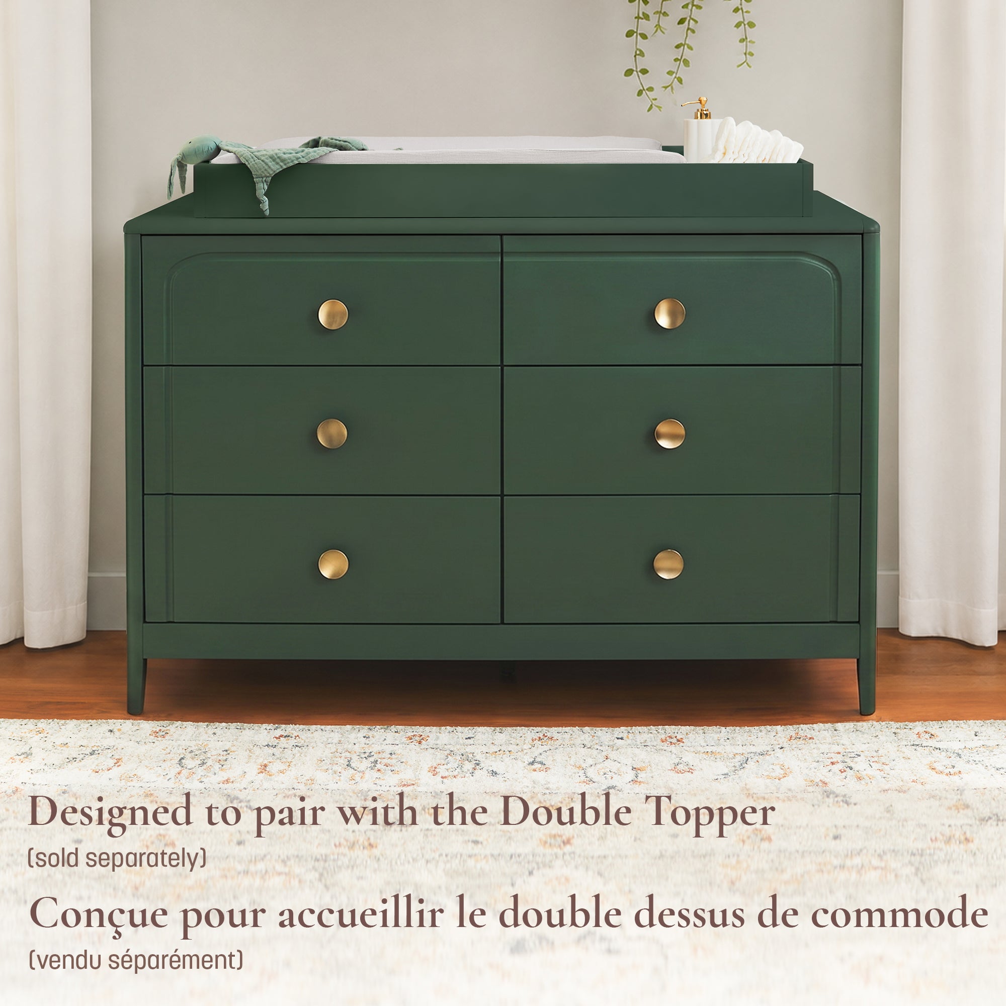 Lifestyle image showing how the Briar 6-drawer dresser is designed to seamlessly pair with a double topper to convert into a nursery changing station.
