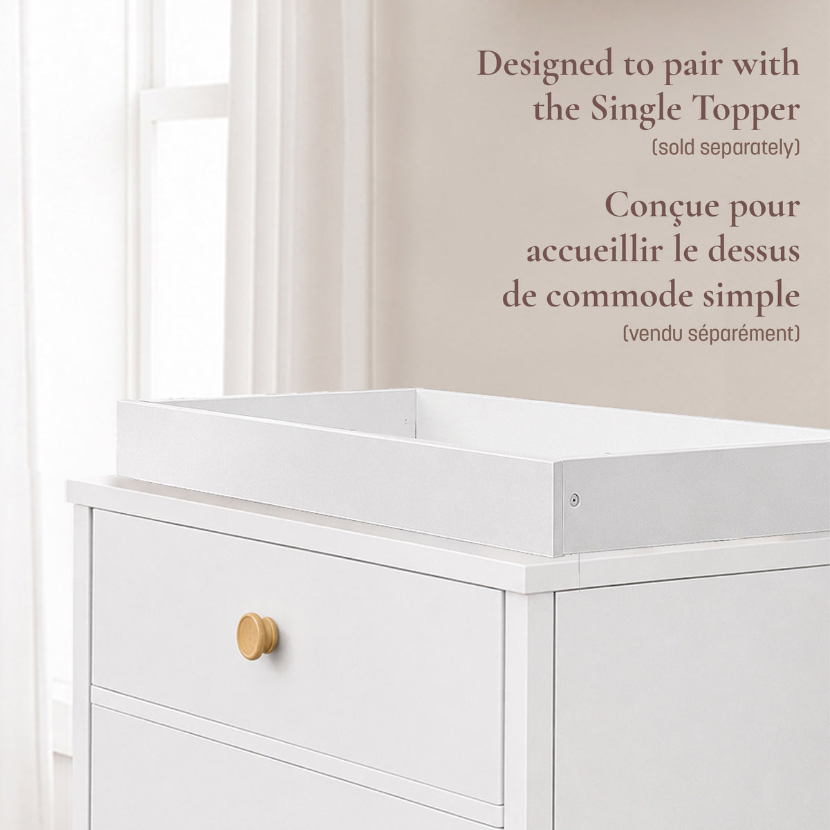 Close-up view showing how the Roo 3-drawer dresser is designed to pair with the Single Topper to convert into a functional changing station.