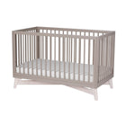 Modern 4-in-1 convertible crib made of solid New Zealand pine that grows with the baby. 