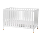 Modern 4-in-1 convertible crib made of solid New Zealand pine that grows from baby to toddler. 