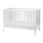 Modern 4-in-1 convertible crib made of solid New Zealand pine that grows from baby to toddler. 