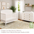 Full Briar Collection nursery suite showing the matching crib and dresser in a styled room setting.
