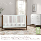 Full Laurel Collection nursery suite showing the matching crib and dresser in a styled room setting.