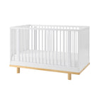Little Seeds Roo Collection 4-in-1 convertible crib, hero shot on a clean white background showcasing its two-tone base, round spindles, and wide accent slats.