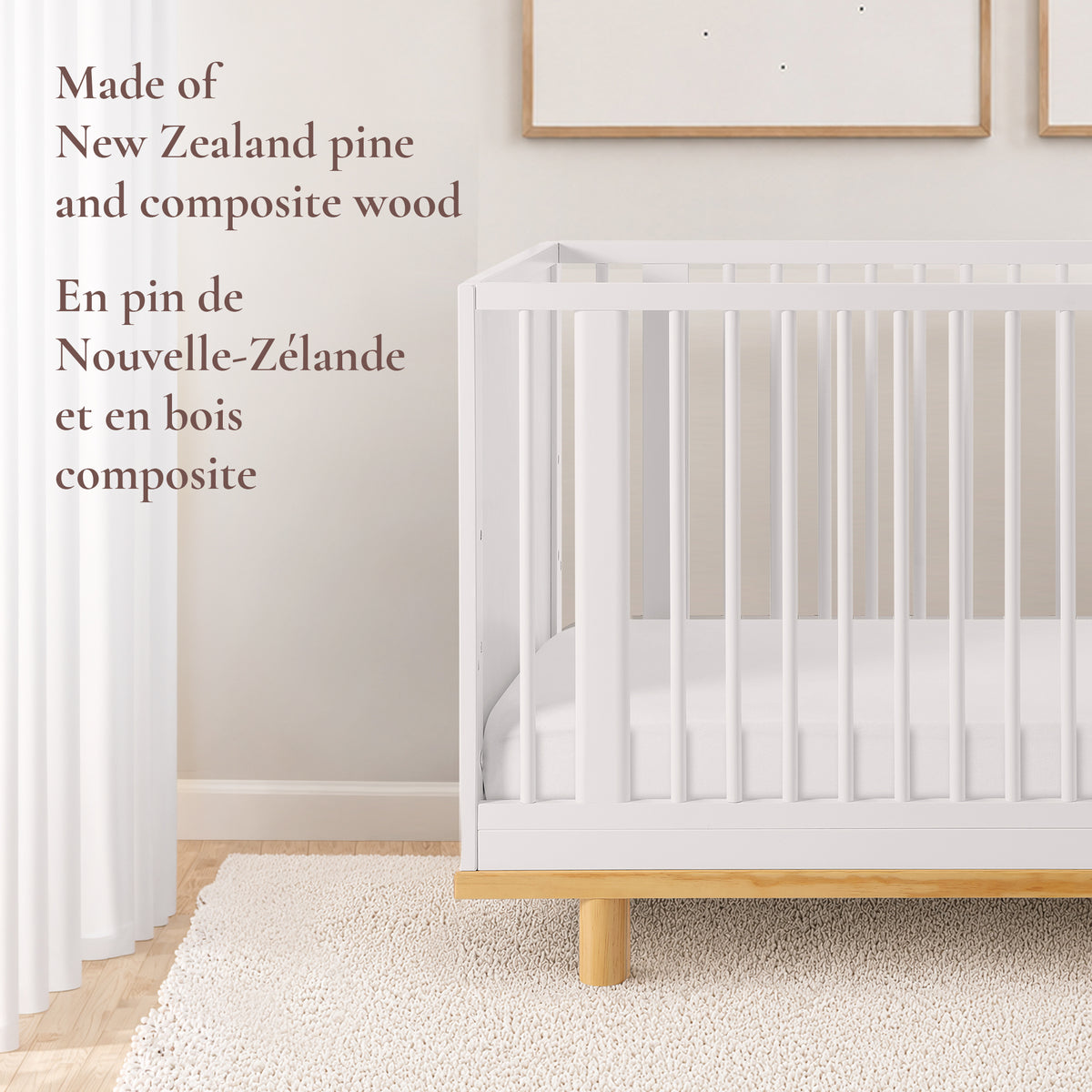 Close-up view of the Roo nursery crib showcasing its durable New Zealand pine and composite wood construction on a natural wood base.